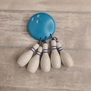 Luxulite bowling pin brooch in Blue. Pinup Retro